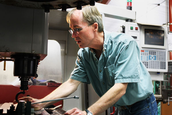 Paul Weal working at Weal Brothers Molding